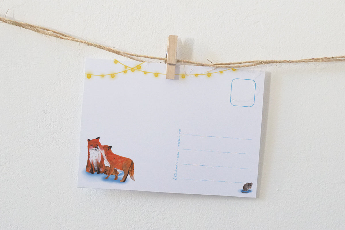 Ansichtkaart | Knuffelende vossen